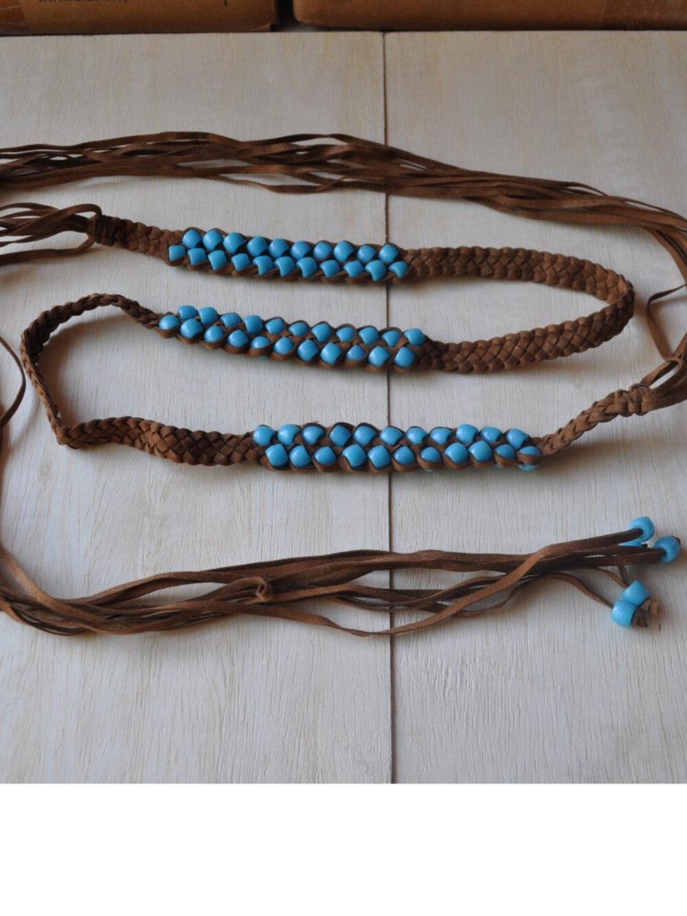 Belt Women's Bohemian boho-style belt features brown braided leather straps
